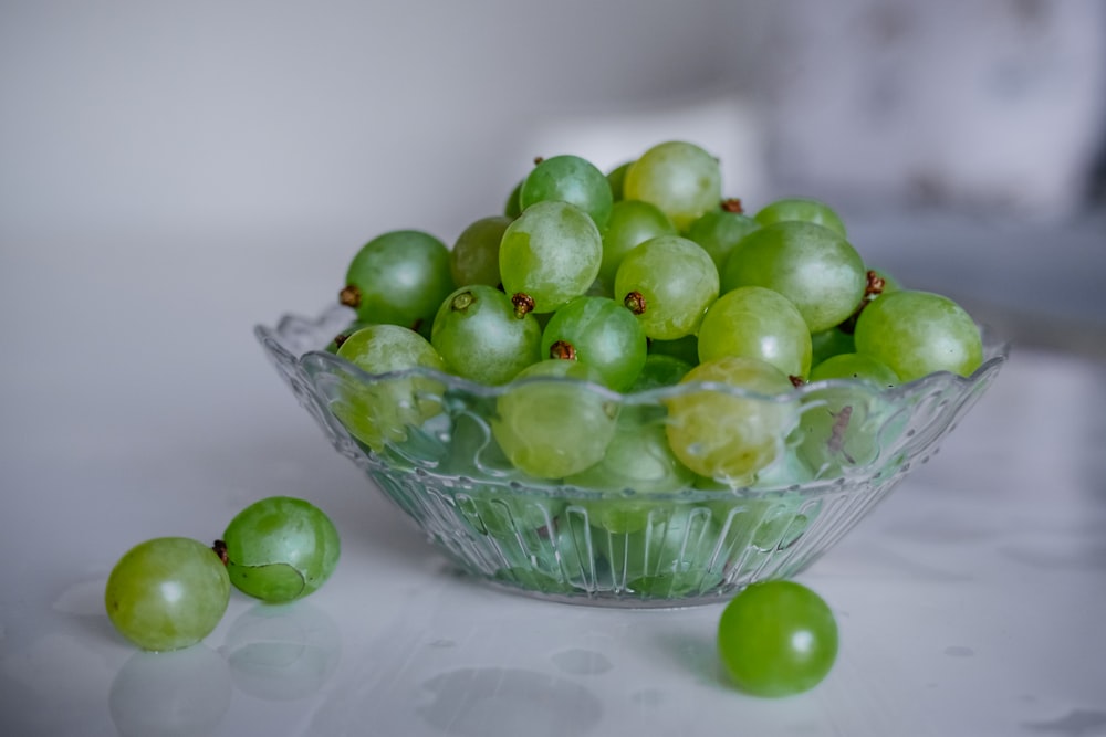green grapes in clear glass bowl