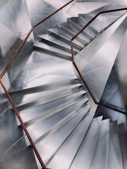 Finished metal staircase installed in a modern home, highlighting clean lines and durability.