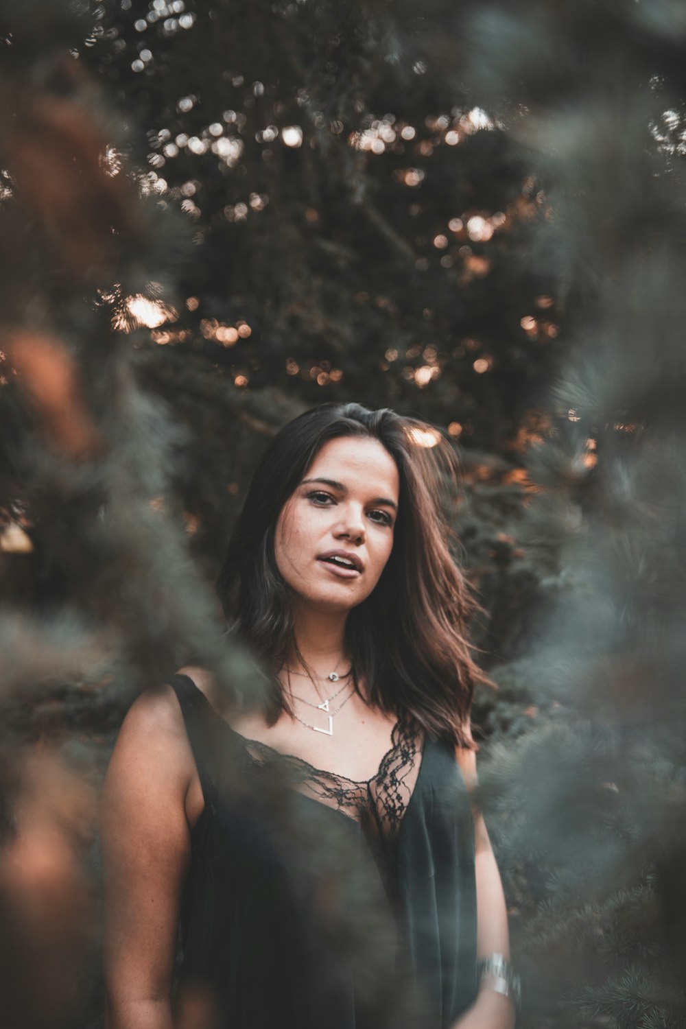 woman wearing black tank dress