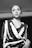 grayscale photography of woman wearing V-neck long-sleeved dress