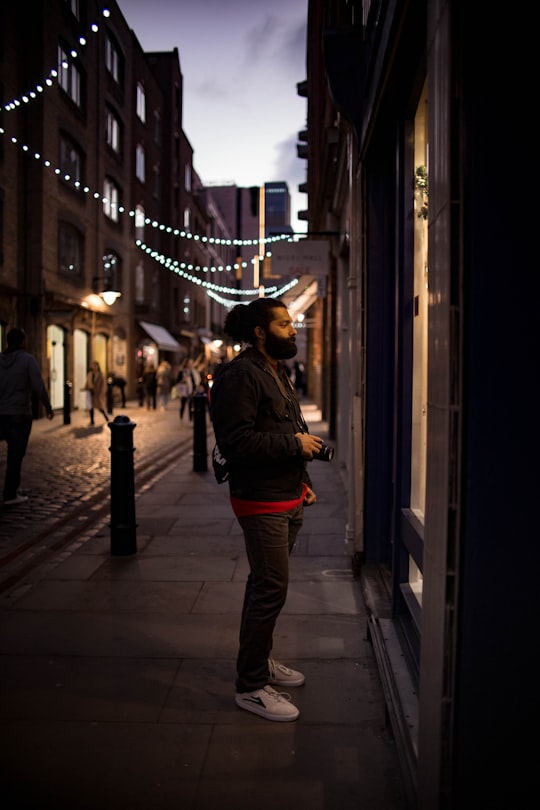man wearing black jacket in Covent Garden United Kingdom