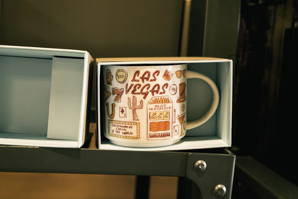 white ceramic mug in white box