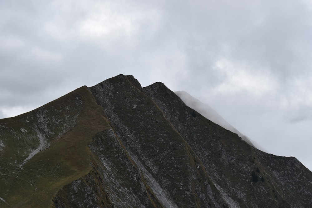 green and brown mountain at daytime