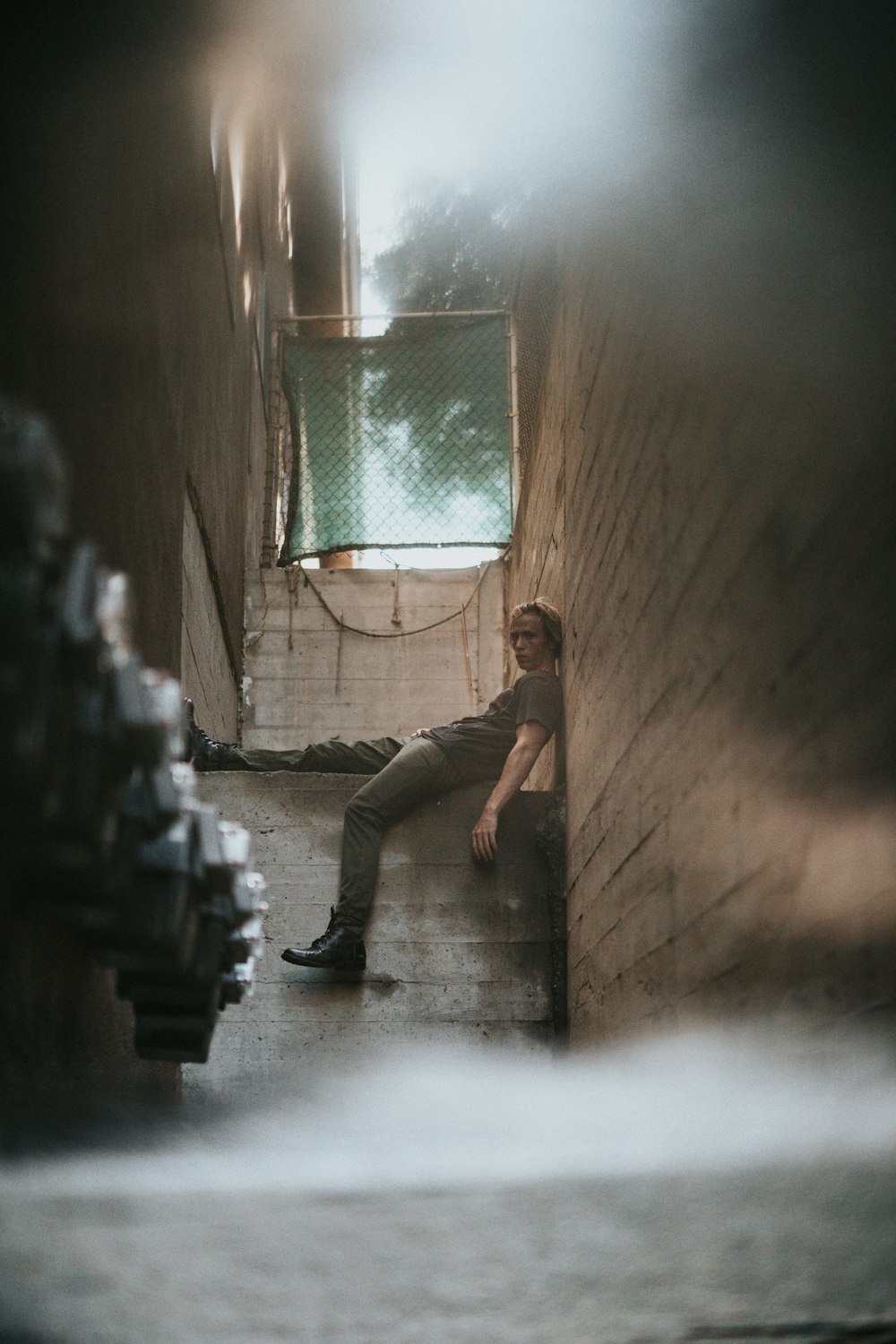 man sitting on stair