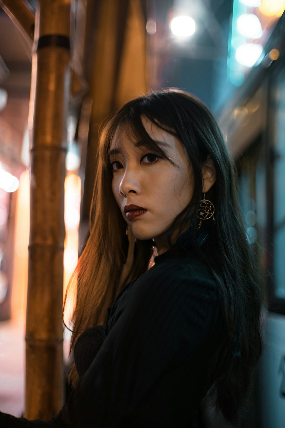 portrait of woman wearing black top