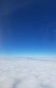 Floating clouds over an infinite horizon with a touch of surrealism.