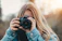 woman taking photo during daytime