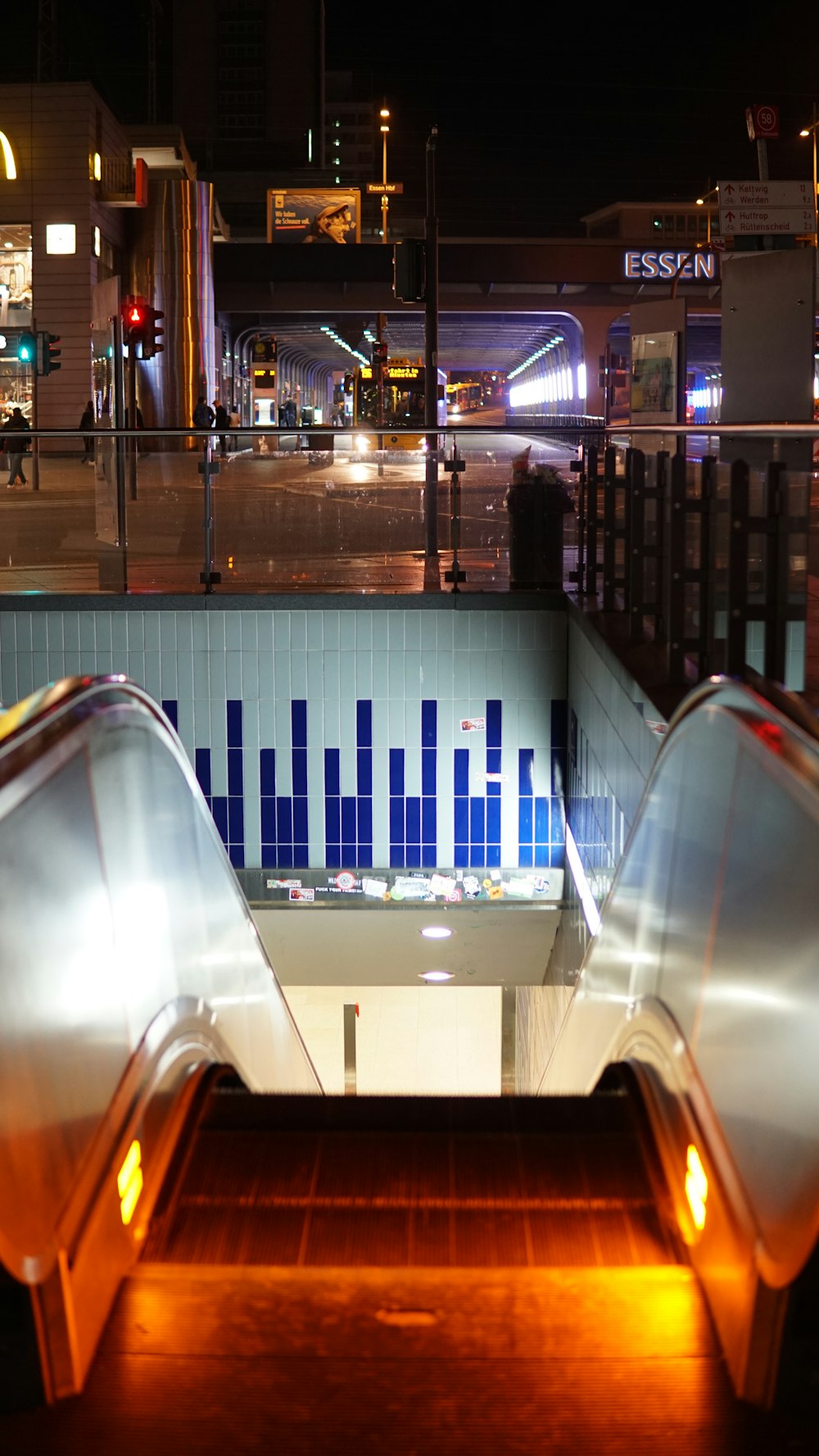 gray escalator during nighttime photo