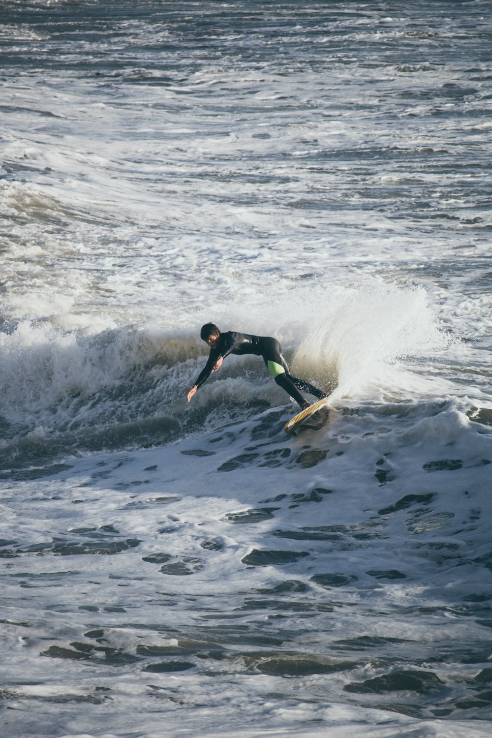 man surfing on waves