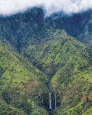 Lush green mountains and waterfalls inviting for adventure sports in Sugamuxi.