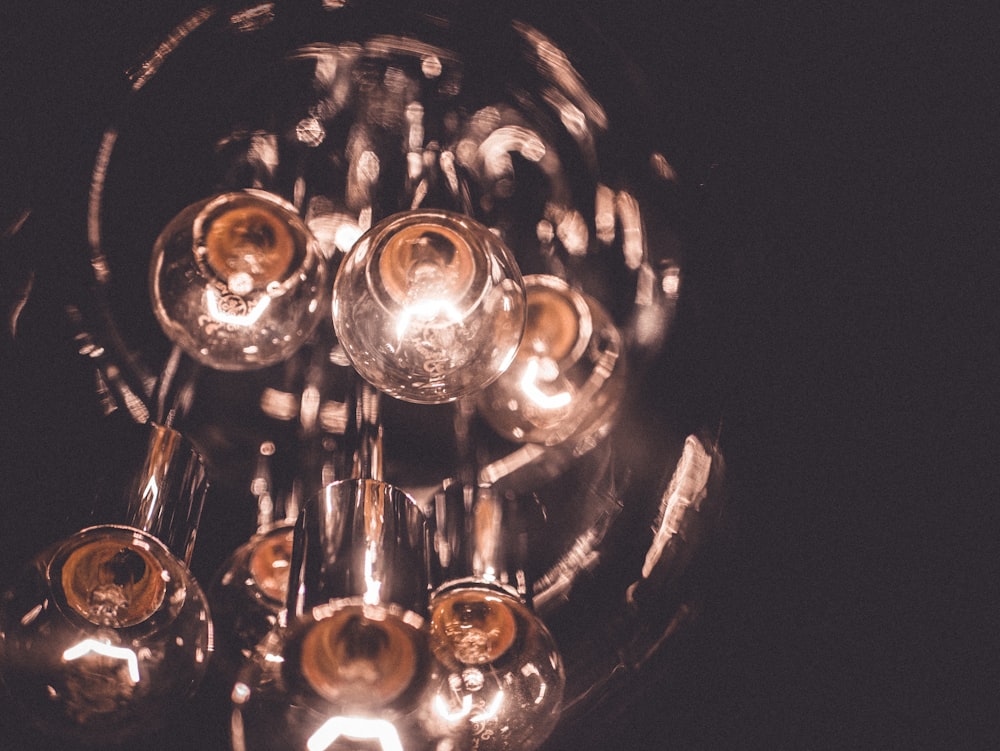 a close up of a chandelier with many lights