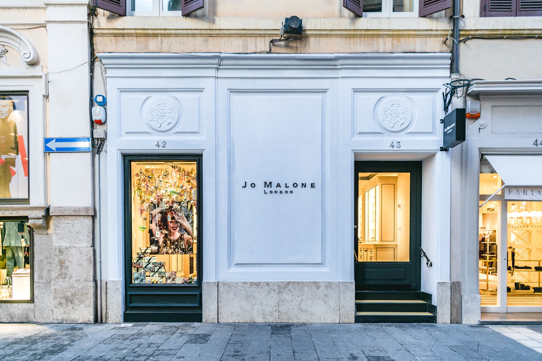 A boutique storefront on a quiet street.
