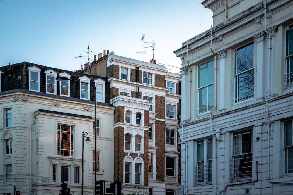 white and brown painted buildings