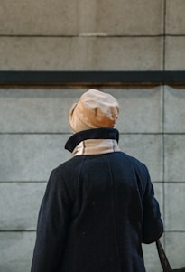 person wearing brown hat