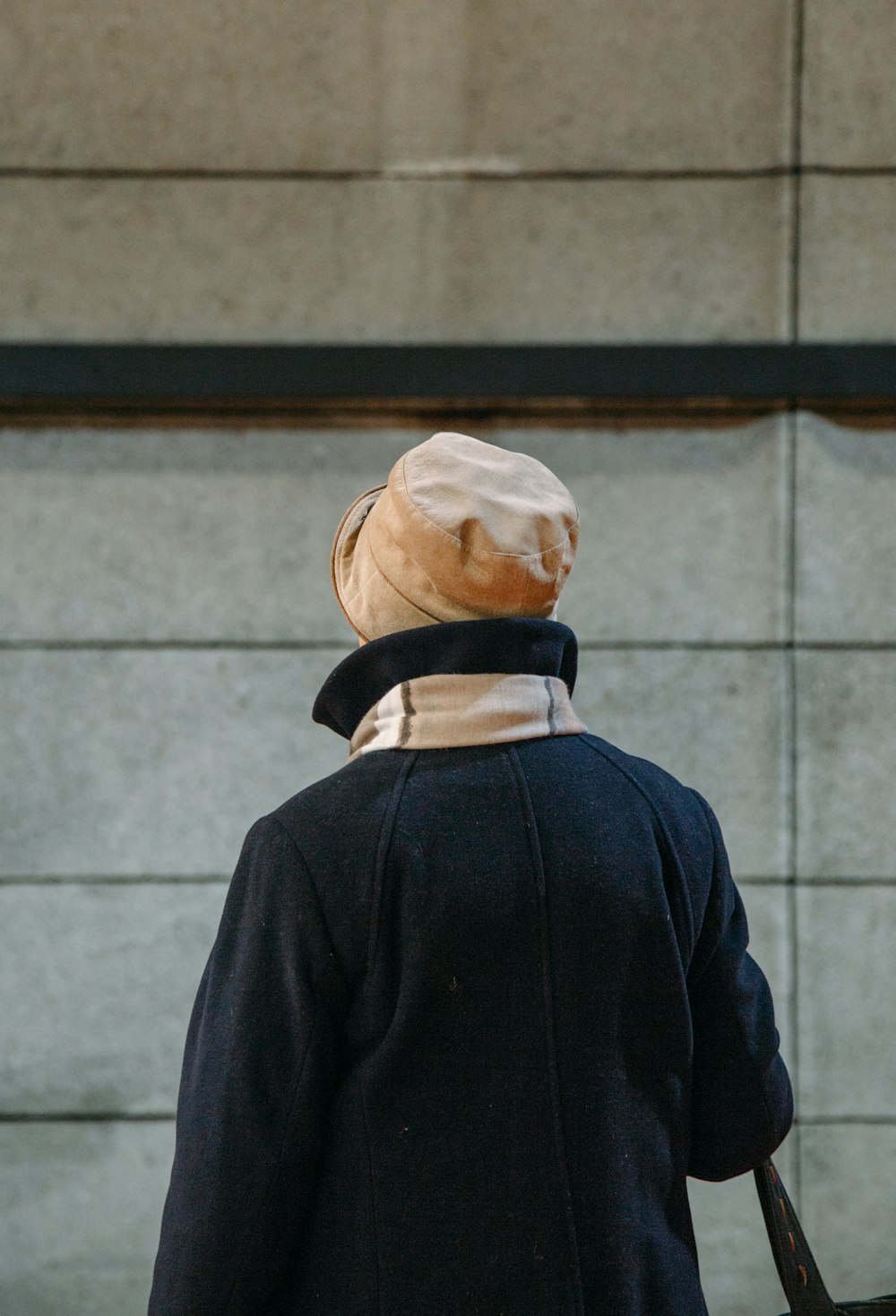 person wearing brown hat