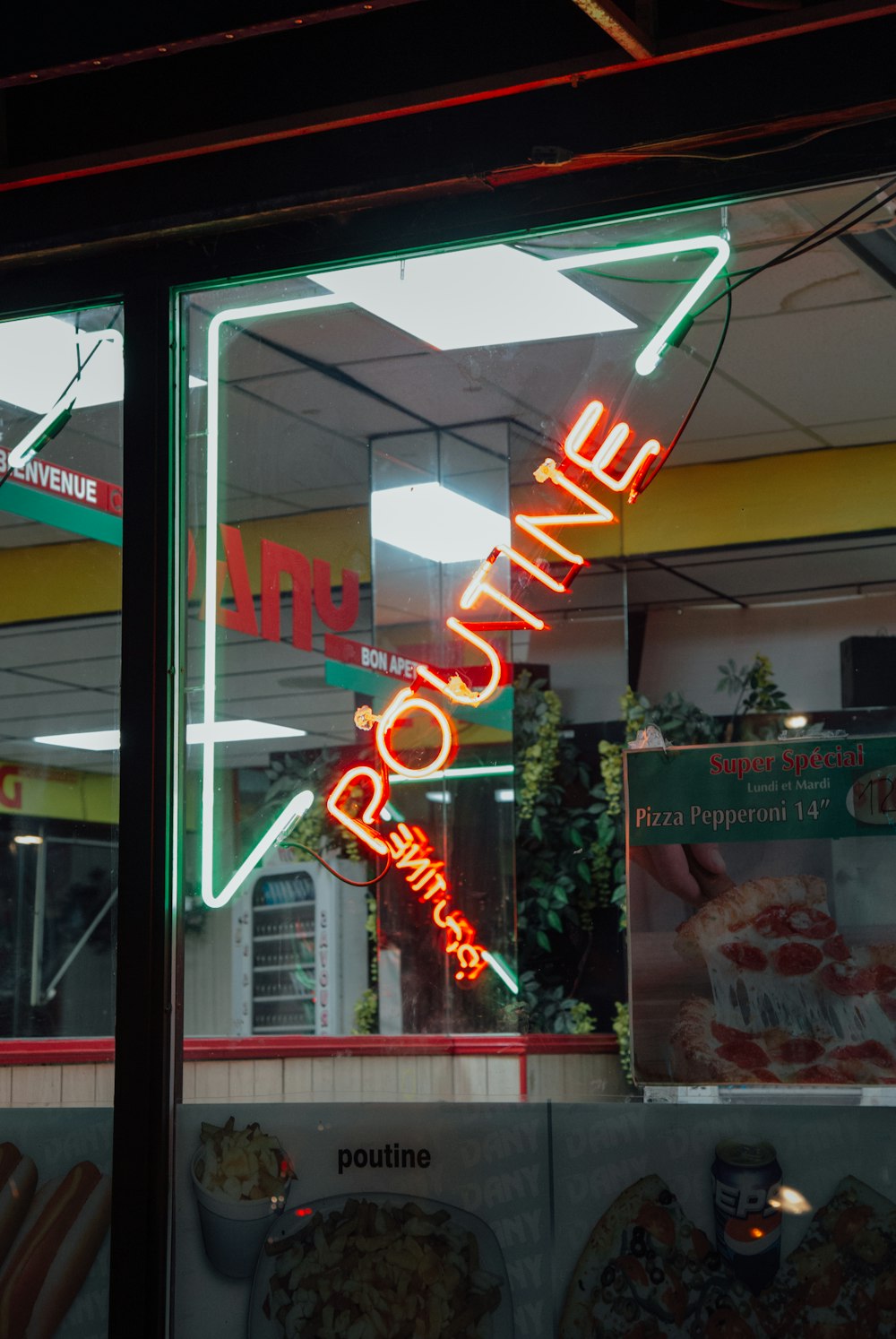 red and green Poutine neon signage