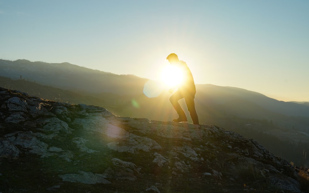 man about to hike black and white mountain