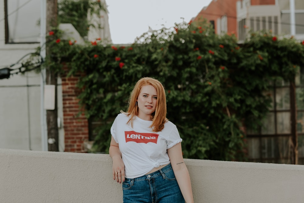 woman wearing white crew-neck t-shirt