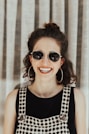 woman wearing white and black rompers and black top