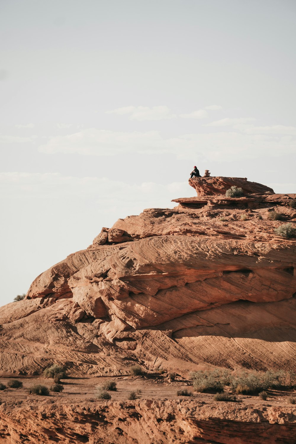 person standing on rock