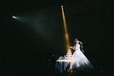 bride and groom standing beside taqble