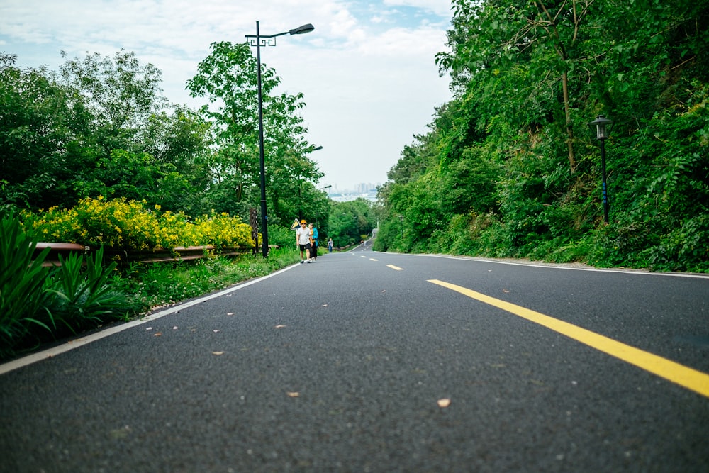 person walking on street during daytime