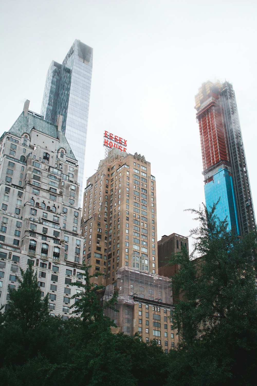 low-angle photography of high rise buildings