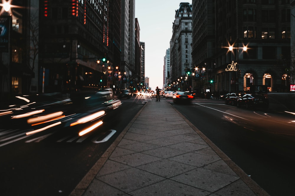 man standing in the middle of the road