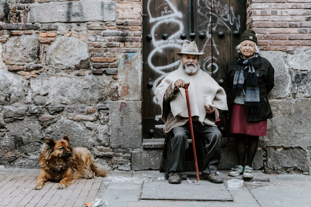 two person sitting near door