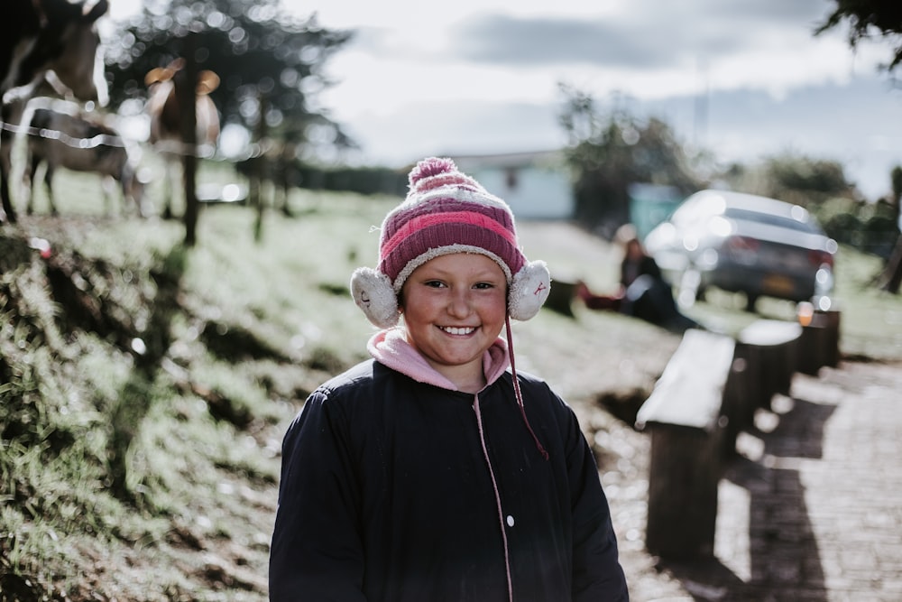 selective focus photography of girl smiling