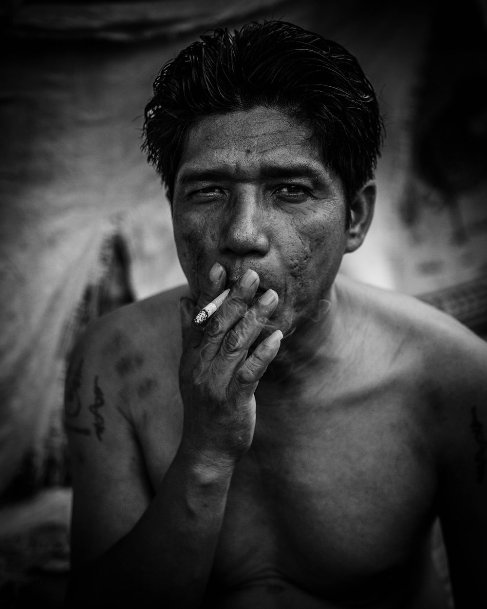 man smoking cigarette