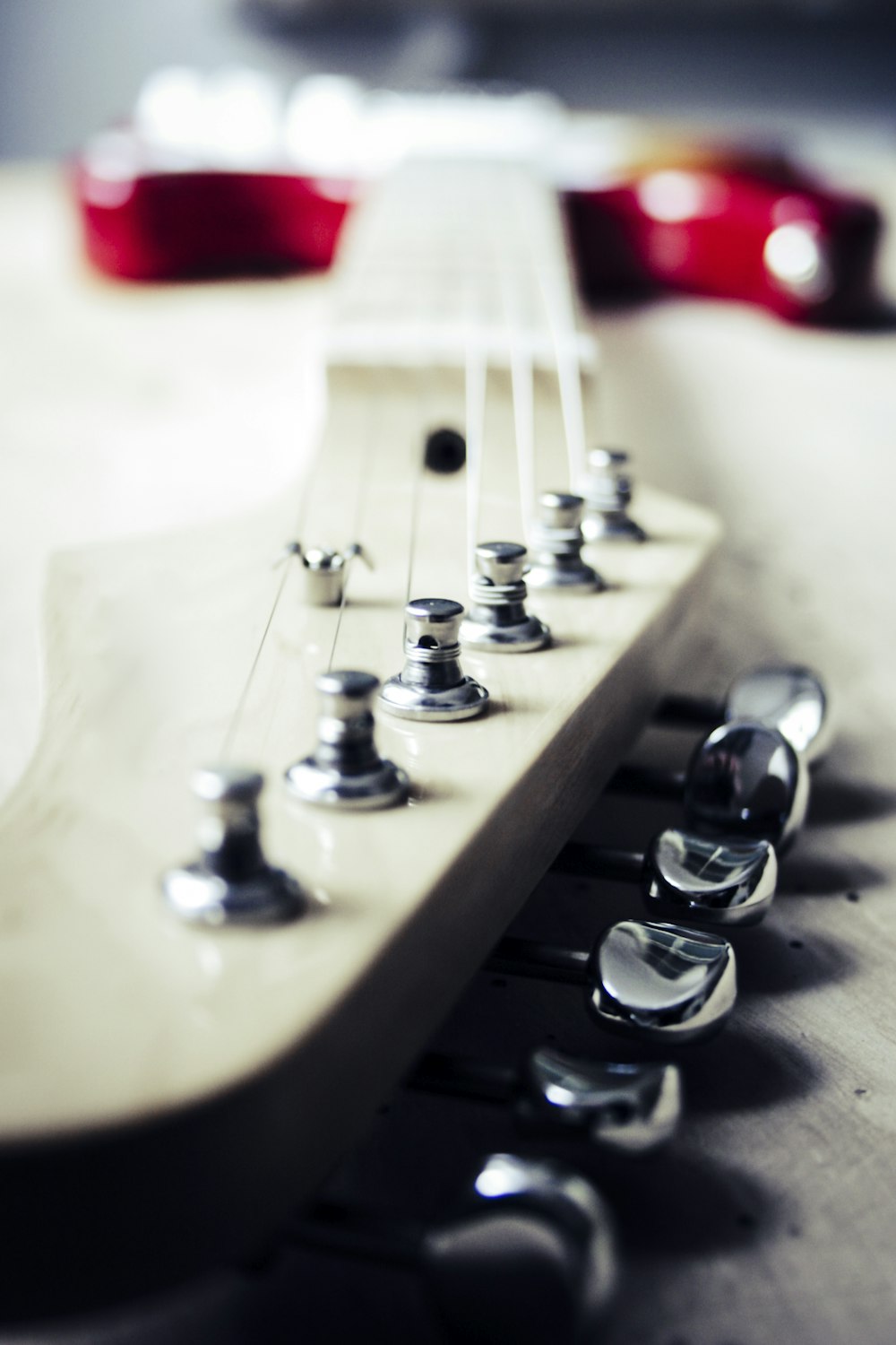 selective focus photography of electric guitar