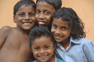 A family happily posing together after their dental checkups, all smiles and relaxed.