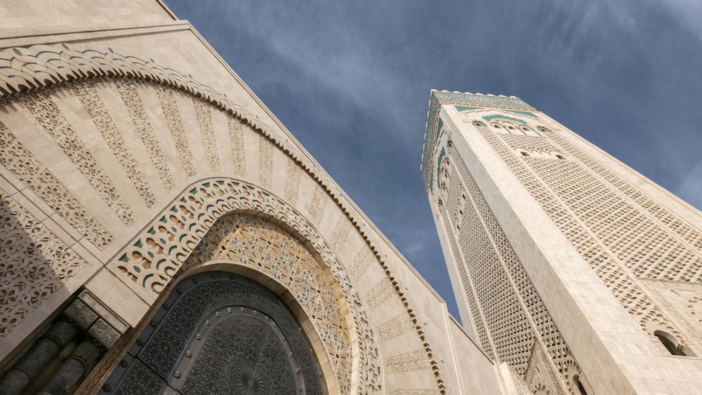 bottom view photography of buildings under blue sky