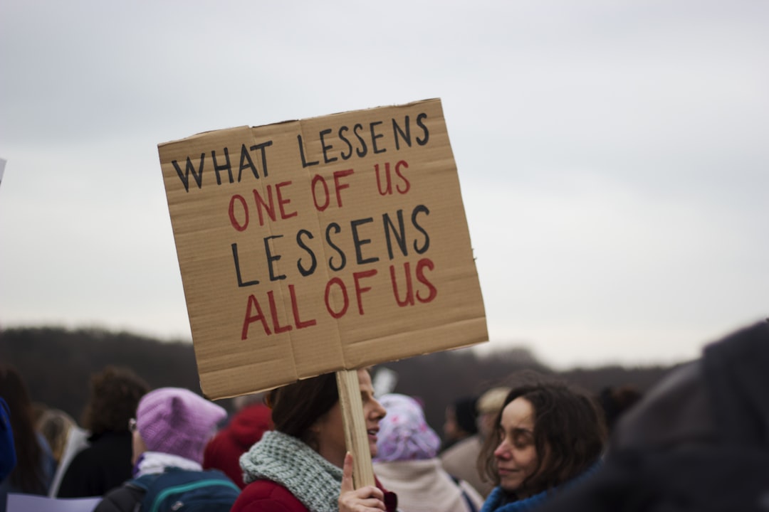 what lessens one of us lessens all of us sign,