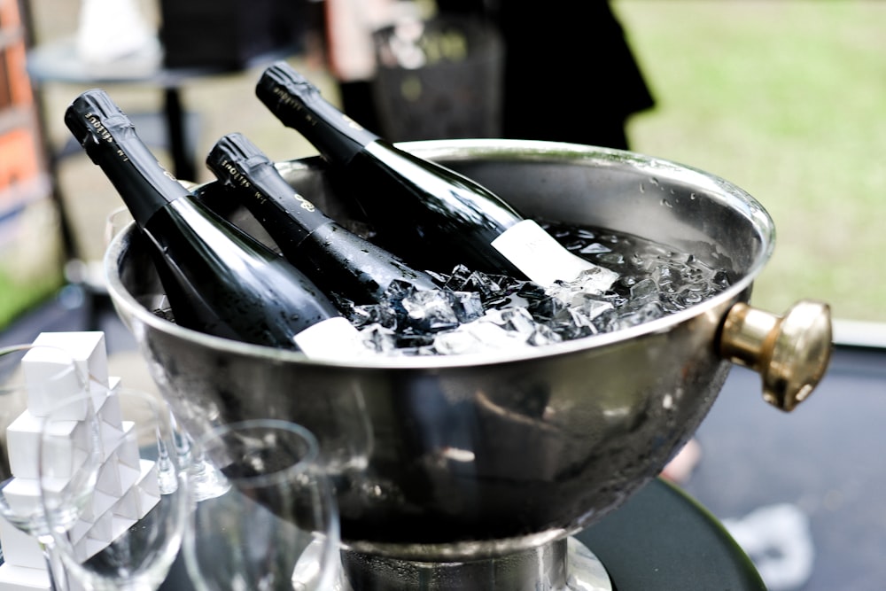 gray steel tray with bottles