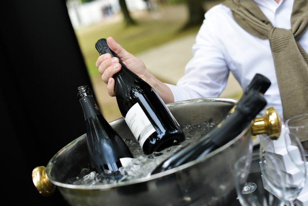 wine bottles in ice bucket