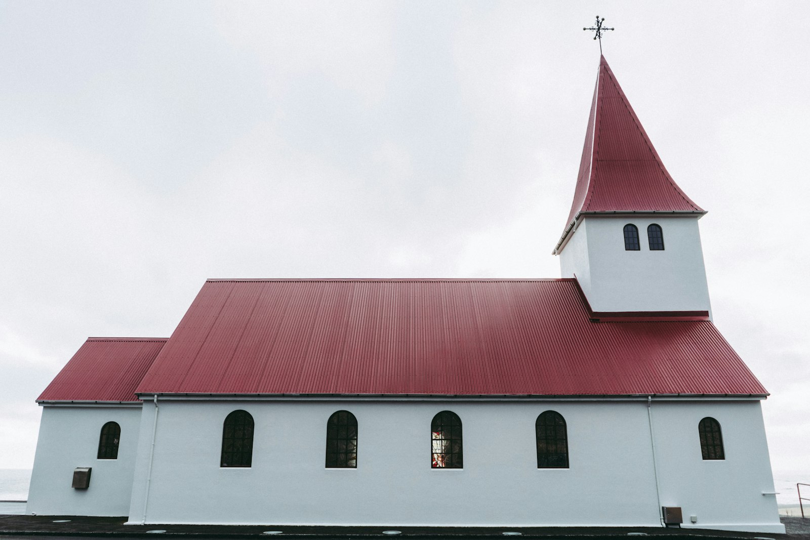 Sony a7R II + Sony FE 28mm F2 sample photo. Red and white church photography