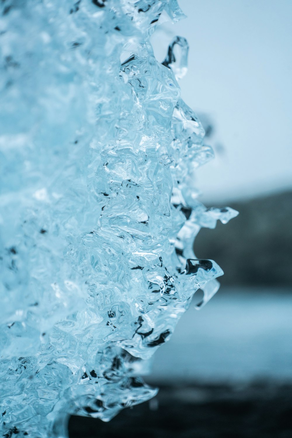 a close up view of ice on the water