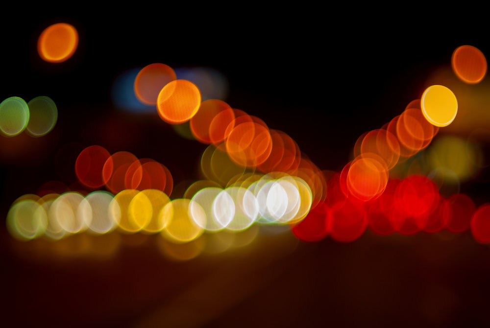 a blurry photo of a city street at night