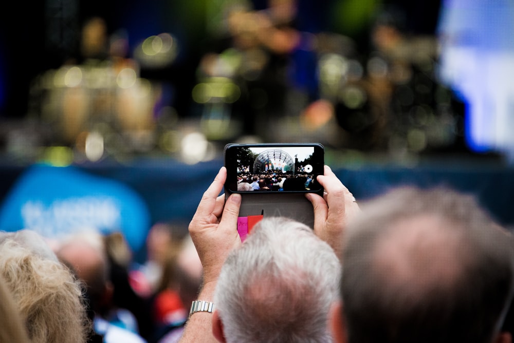 person holding Android smartphone