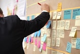 sticky notes on corkboard