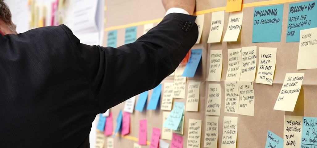 sticky notes on corkboard