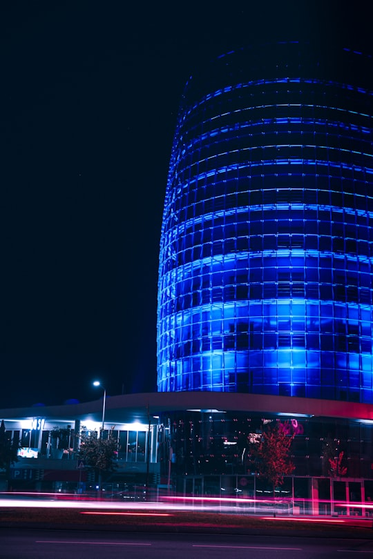 blue high-rise building photography at night in Braga Portugal