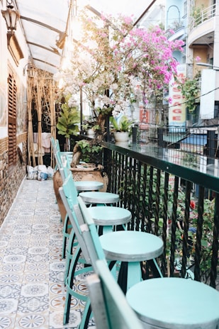 A vibrant stool that enhances your balcony decor.