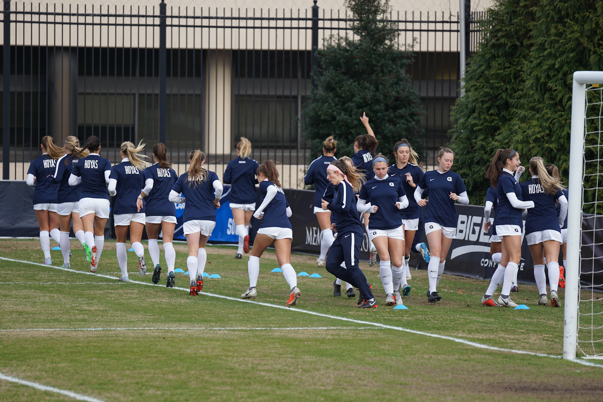 woman wearing yellow long-sleeved dress under white clouds and blue sky during daytime
