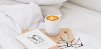 coffee in ceramic mug served on board