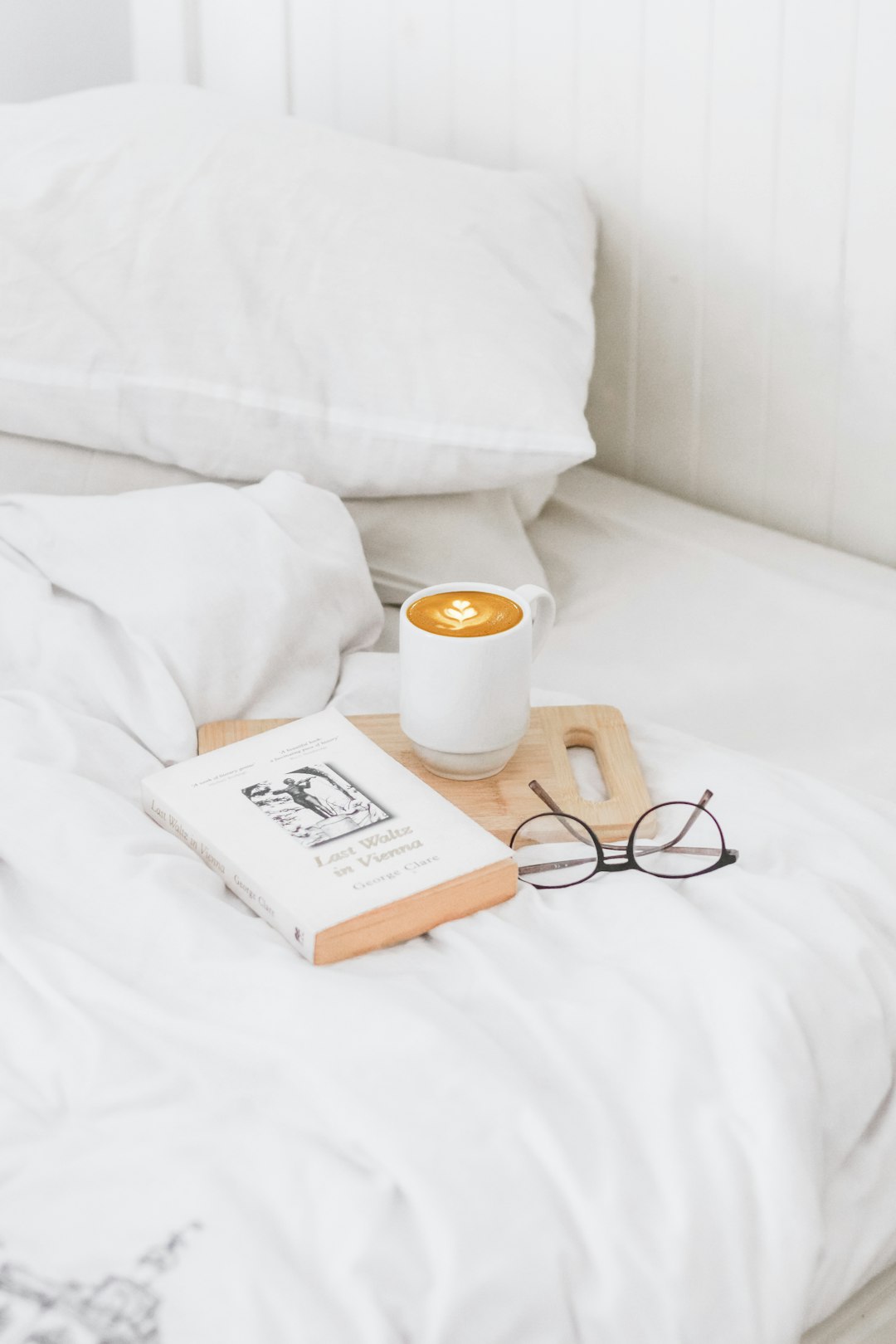  coffee in ceramic mug served on board bed