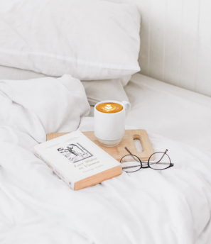 coffee in ceramic mug served on board