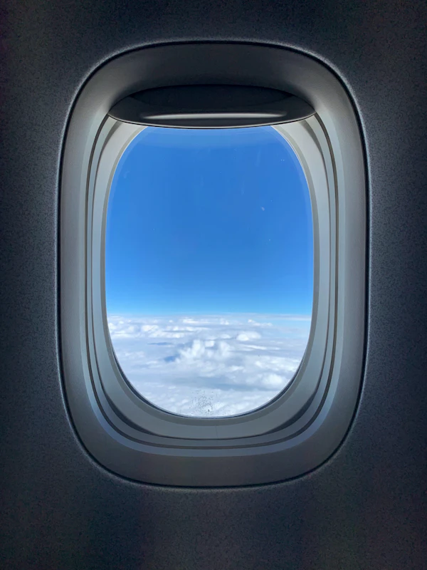 Passenger airplane above the clouds